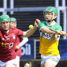 Fiachra Carroll (Offaly) clears ahead of Eoghan Beehan (Westmeath). Picture: Aoife Maher