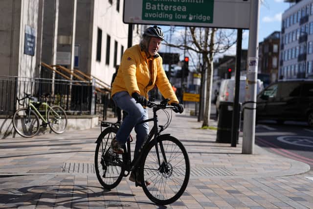The 63-year-old arrived at Lavender Hill Magistrates’ Court by bike on Thursday morning wearing an orange shirt and coat.