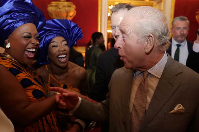 Those attending the reception were eager to meet the King, who seemed in good spirits as he moved through the crowd.