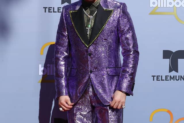 2018: Billboard Awards purple brocade and Seventies flair