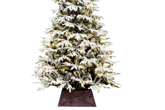 2. The Pre-lit Snowy Alpine Tree Warm White (4ft to 12ft), from £69.99, Christmas Tree World