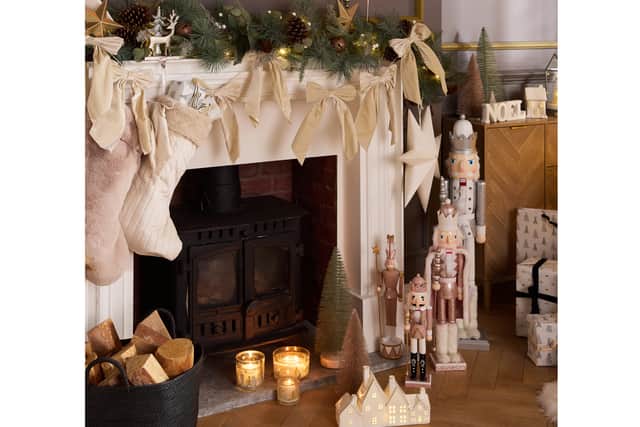8. Pre-lit Wreath with Bells – 65cm, £25; Pre-lit Garland with Bells – 180cm, £25; Cream Bow Garland – 1.5m, £7; White Stars, £2 each; rest of items from a selection, B&M Home, in-store