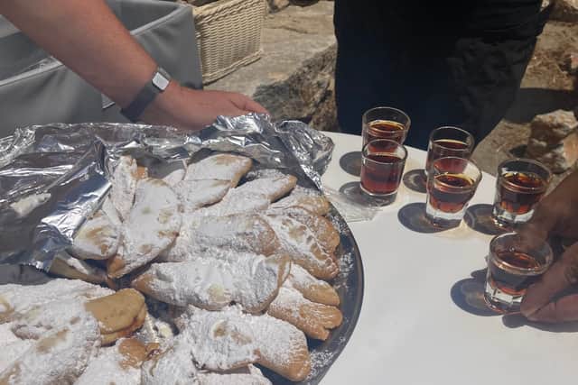 Stepping inside to the cooling interior is a relief, and an unexpected extra delight comes in the form of a small glass of the local liquor psimeni raki – which someone rightly claims “tastes like Christmas” thanks to ingredients like cinnamon and clove.