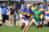 Aaron Kenny (St. Rynaghs) gets there ahead of Jack Screeney (Kilcormac / Killoughey). Picture: Aoife Maher.