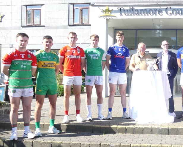 Offaly senior football captains with Offaly GAA chairman Tom Parlon and sponsor.