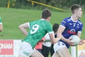 Ballycomm's Paul Conway is chased by Ferbane's Eoghan Grennan. Picture: Ger Rogers