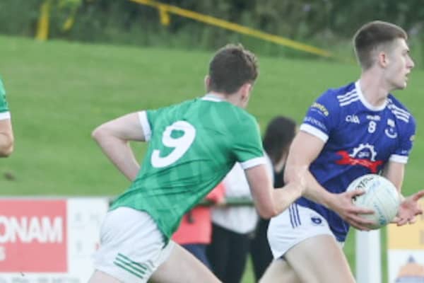 Ballycomm's Paul Conway is chased by Ferbane's Eoghan Grennan. Picture: Ger Rogers