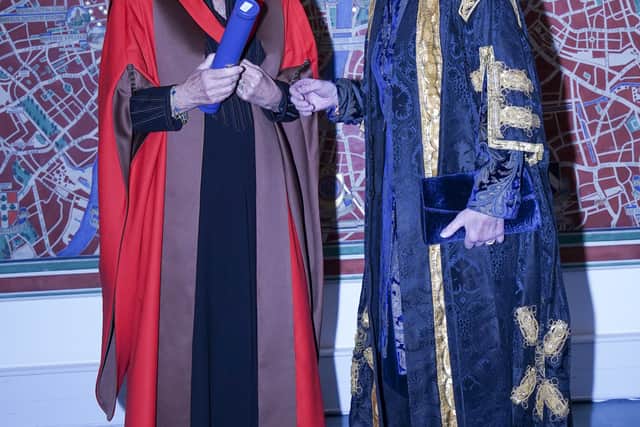 The sisters-in-law then greeted other honorary graduates and fellows, before Camilla was briefly joined by the young son of honouree Dr Nahim Ahmed, who playfully climbed onto a window ledge behind her as she signed a visitors’ book.