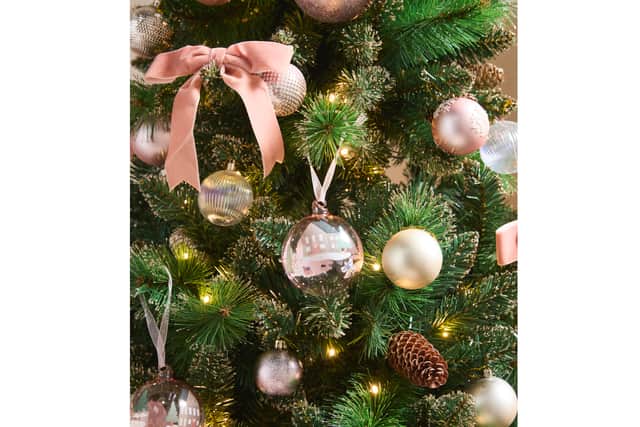3. B&M Festive sparkle: Blush Luxury Baubles, 6 pack, £4; Velvet Clip Bows, 6 pack, £3, Animal Scene Bauble, £2, B&M Stores, in-store