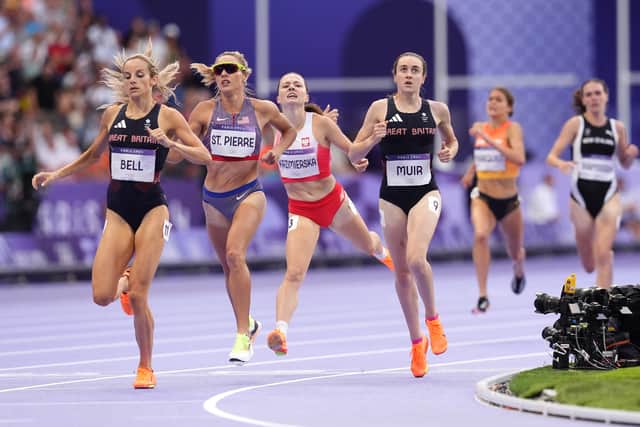 British champion Bell overtook her team-mate in the last 100 metres to cross in 3:59.49 as the second-fastest finisher behind the world record holder.