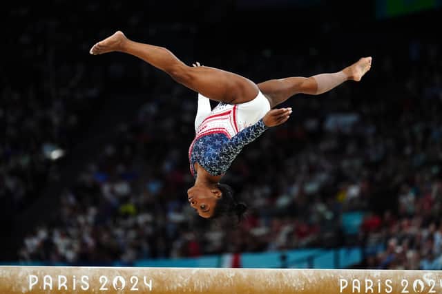 Biles returns