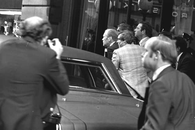 Two days later, Oswald was being taken from police headquarters to the county jail when Dallas nightclub owner Jack Ruby rushed forward and fatally shot Oswald.