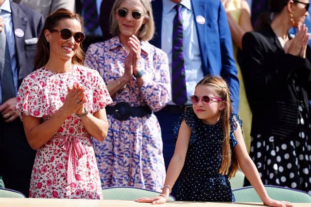 While meeting the players, Kate said Charlotte, who was wearing a navy polka dot dress, had been “practising yesterday” and that tennis was “really great for the youngsters”.