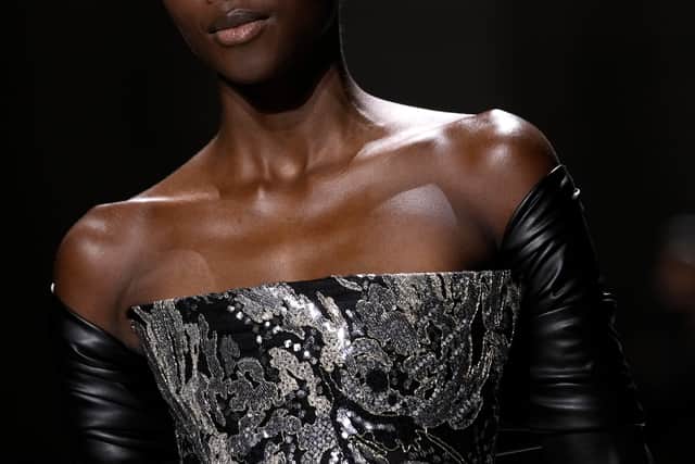 The label’s quintessentially feminine fantasy was indulged through opulent ostrich feathered jackets, elegant sweetheart necklines and delicate opera gloves.
