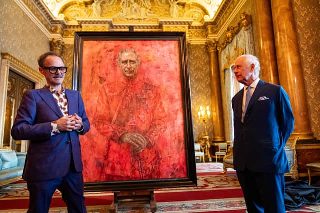 Jonathan Yeo’s striking depiction of Charles shows the monarch bathed in a dramatic red hue.