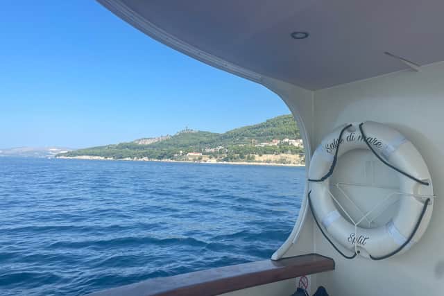 The boat is pleasant, with soft wood furnishings, a wide sun deck of loungers on its roof and even a Jacuzzi sat behind its prow. We are welcomed on board by a Croatian crew who serve a three course lunch in the vessel’s gilded bar and dining area – a daily meal which, along with a buffet breakfast, is included in the price.