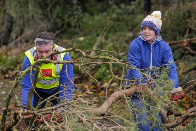 An Irish postwoman was taken to hospital after being hit by flying debris in County Limerick during Storm Debi, according to the postal service.