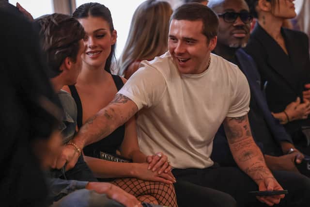 Model and actor Peltz, 28, donned a black minidress and fishnet tights.
