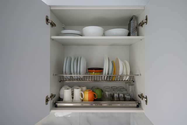 Install extra shelving inside cupboards
