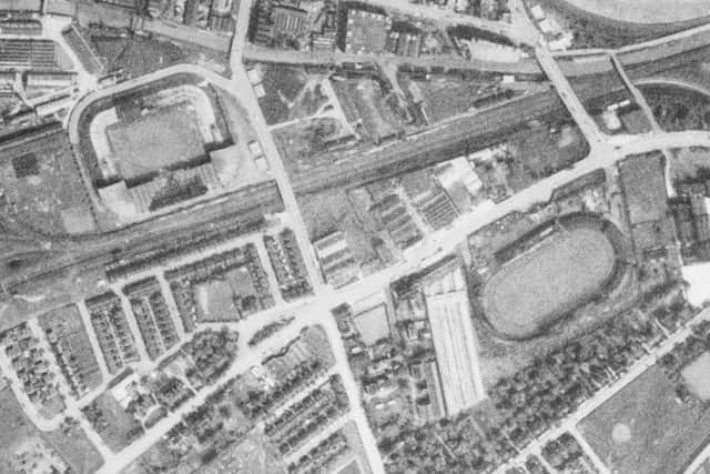 Damage to the main stand of the football ground can be seen in the photo, after it was hit in a bombing raid in March 1941. The home of Manchester United was not used again for football until 1949.