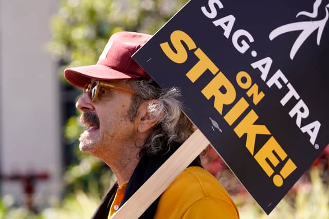 Scores of big Hollywood names including Academy Award winners Jessica Chastain and Brendan Fraser, and fellow actors Bryan Cranston, Bob Odenkirk and Hilary Duff have been pictured on the picket lines in Los Angeles and New York over the past four weeks.