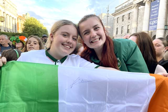 “I saw her looking ‘can someone get a flag?’, and I was like ‘here, have it!’. It’s just a chance that she signed it,” Ellie said, adding the flag would now hang in her bedroom.