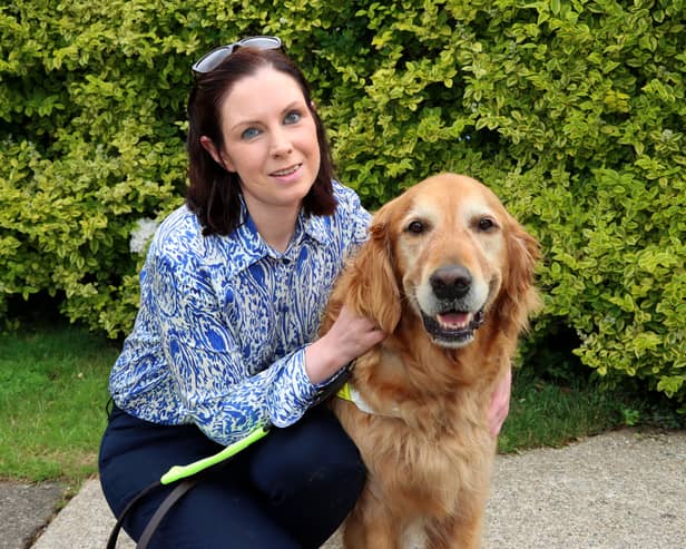 Léan Kennedy and her guide dog, Higgins | PICTURE: Adrian Butler