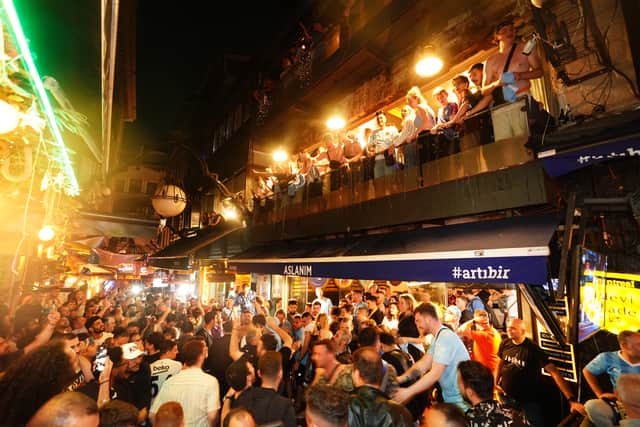 As the final whistle blew, they exploded into cheers of ecstasy.