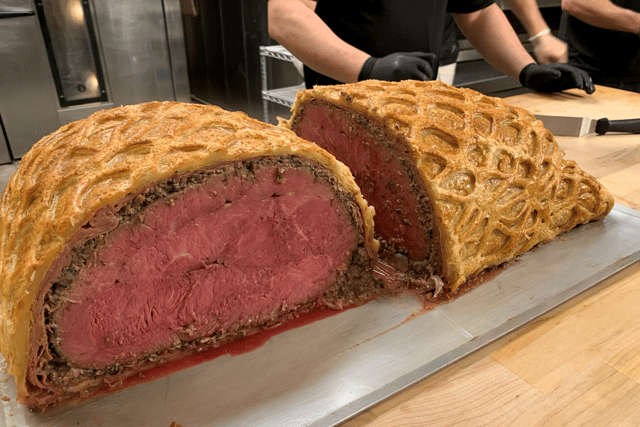 A video of the world record-breaking moment, and how the pair made the dish, was posted to Twitter by DiGiovanni which shows how they prepared 18kg (40lbs) of beef to create the massive wellington.