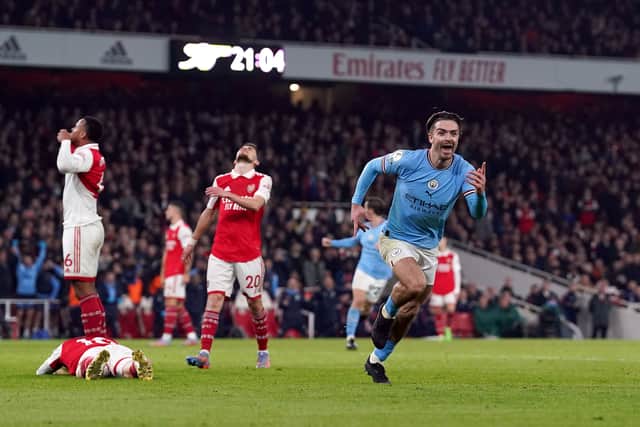 Erling Haaland wraps up win as Man City beat Arsenal to go top of ...