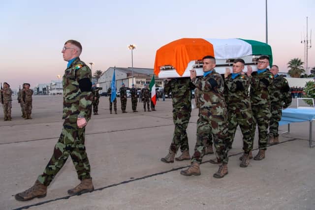 Pte Rooney’s coffin was driven away in a hearse accompanied by a Garda escort shortly afterwards.