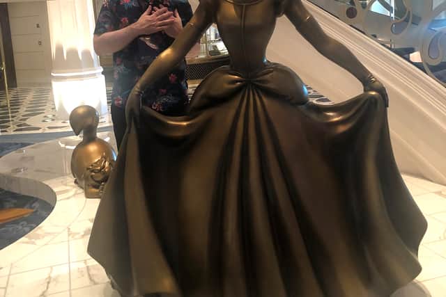 Enchantment is the theme of Disney Cruise Line’s impressive fifth ship and magical touches begin with mischievous mice Jaq and Gus peeking out from beneath Cinderella’s sculpted ballgown, catching the attention of a slinking Lucifer the cat with a bowl clasped menacingly between his claws.