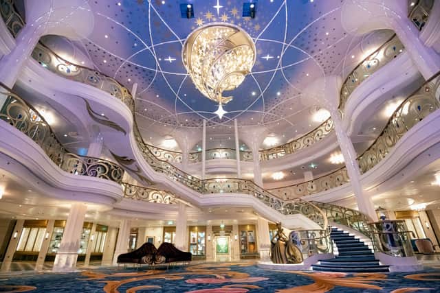 At night, a chandelier-lighting ceremony dubbed the Kiss Goodnight reveals ribbons of lights embedded in the ornate architecture and chimes that signal the end of Cinderella’s dance d’amour.