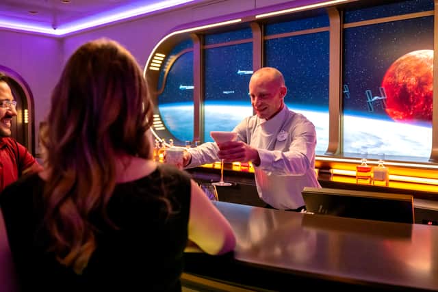 Accessed on deck four via an airlock that opens with a satisfying whoosh, the lounge has limited seating for around 35 parched Padawans, so book a timed 45-minute slot as soon as you board.