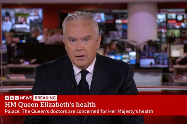 Presenter Huw Edwards is dressed in a dark suit, white shirt and black tie, in line with the BBC’s dress code for when a member of the royal family dies as a mark of respect.