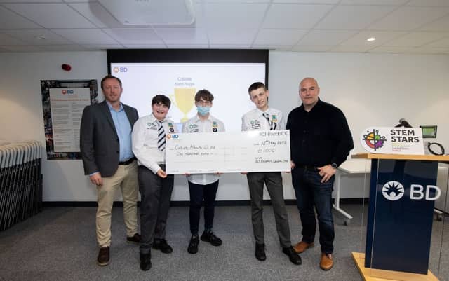 John Carey, BD and Padraig Fitzgerald, BD RCI’s Site Director making a presentation to Coláiste Mhuire Co-Ed in Thurles who received Special Commendation Certificate and a €1,000 for their project