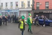 St Patrick and Carrick-on-Suir Brass Band lead Carrick-on-Suir's St Patrick's Day Parade with Margo Kavanagh carrying the Cathleen Fahey Cup