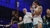 Caroline Dubois beats Terri Harper to hold WBO and WBC world lightweight titles