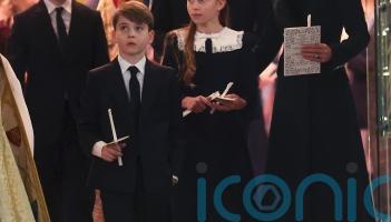 George, Charlotte and Louis get into the festive spirit at Kate’s carol service