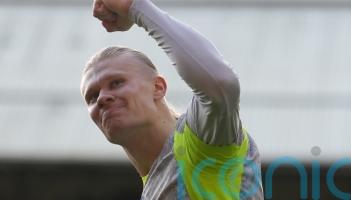 Erling Haaland scores twice as Manchester City close within two of Arsenal