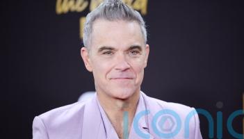 Robbie Williams on track to break The Beatles&rsquo; record for number one albums