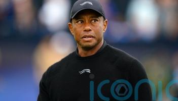 Tiger Woods told officers he was looking at phone before crash &ndash; police report
