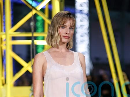 Margot Robbie debuts new haircut as stars attend Chanel show at Paris Fashion Week