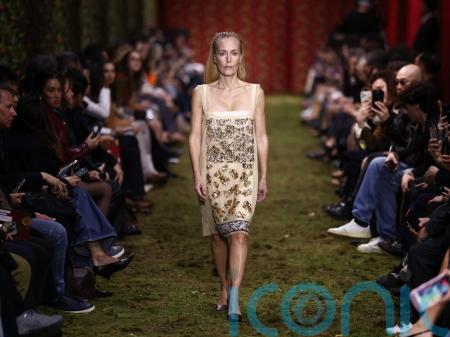 Gillian Anderson walks Miu Miu runway to close Paris Fashion Week