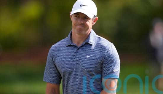 Rory McIlroy struggles with back problems to two over at Players Championship