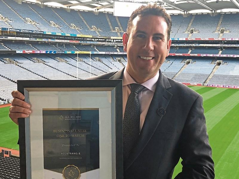 Knockainey man Brian O&rsquo;Callaghan with a business all-star award he won in Croke Park