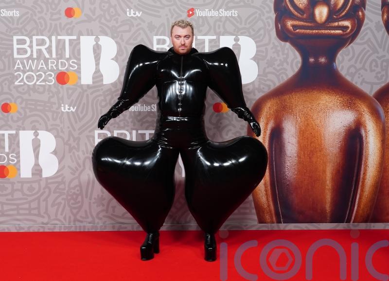 Sam Smith dons latex bodysuit for Brits red carpet dominated by black outfits