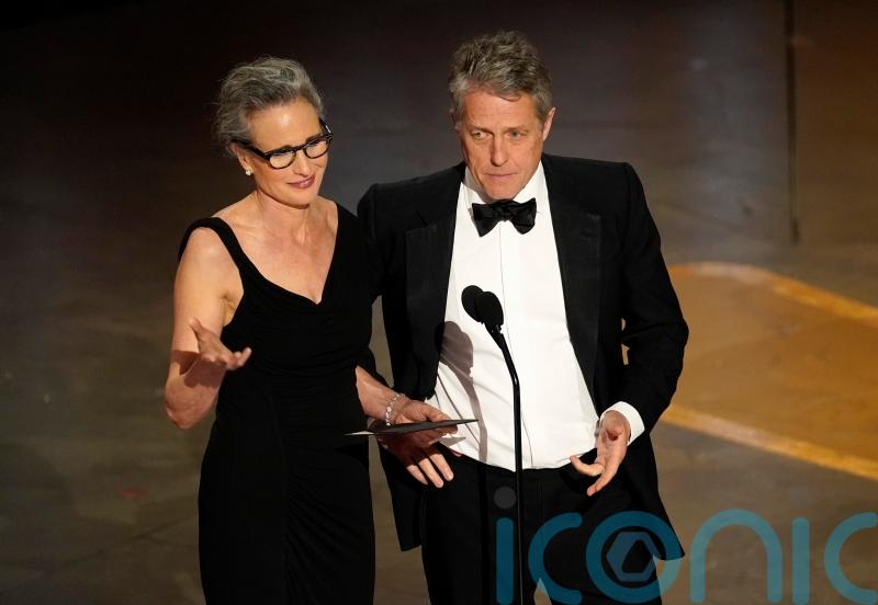 Hugh Grant presents award with Andie MacDowell after ‘awkward’ Oscars interview
