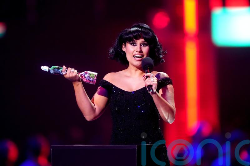 Raye storms Brits early with four awards