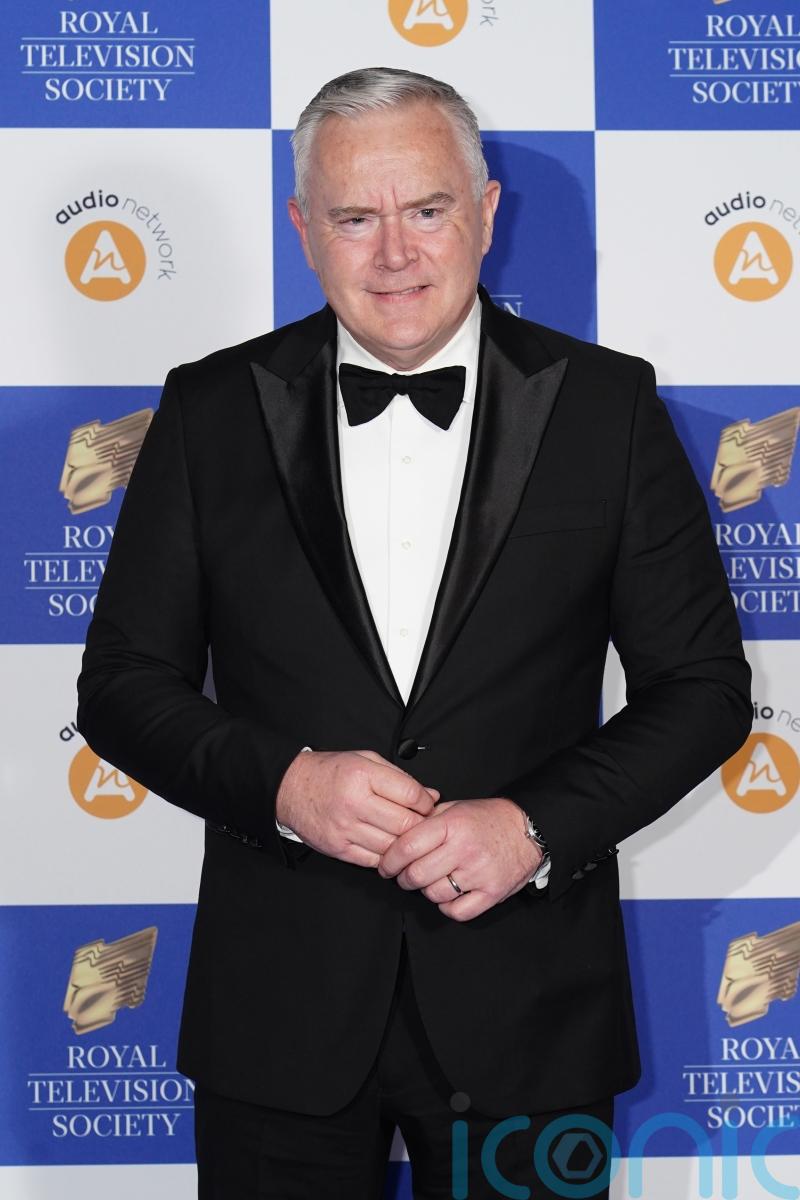 Former BBC presenter Huw Edwards charged with making indecent images of children